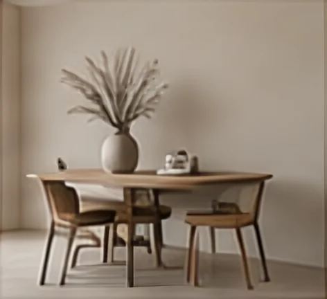 Round dining table with timber chairs and a vase of branches in a neutral room