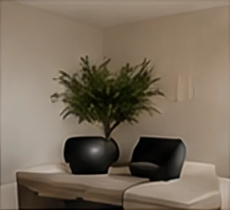 Styled corner with a sculptural black chair, olive plant and stone floor
